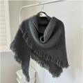 Soft dark grey knit wool shawl with tassels hanging on a hanger in bright natural light - Dark Gray