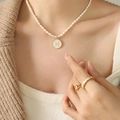 Pisces constellation pearl necklace with gold circular pendant and shell inlay for women - Pisces