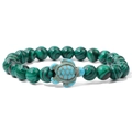 Natural malachite beaded bracelet featuring a light blue sea turtle pendant centerpiece - Malachite