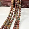Strand of natural mixed Picasso stone beads in earthy red, yellow and brown tones - Red Turquoise 25 / 6mm / Approx 63pcs