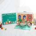 3D Pop-up Christmas card with festive party scene design, green and orange holiday theme - Christmas Dinner