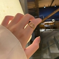 Close-up of 18k gold-plated stainless steel pig-nose ring on a female finger - KTG039J-Pig Nose Link Chain Style