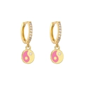 Macro detail of gold-plated hoop earrings with pink and white yin yang pendants and cubic zirconia - Pink White Tai Chi