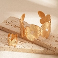 Detailed view of golden butterfly bangle and ring set with intricate wing textures - Bracelet - Gold Butterfly (2-Piece Set)