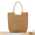 Minimalist hand-woven straw tote bag in natural finish for beach and summer travel - Camel