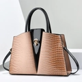 Detail of contrast stitching and crocodile texture on large business handbag for women - Khaki