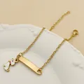 Bracelet chaîne plaqué or 18K avec breloque chien blanc et plaque à graver - Chien