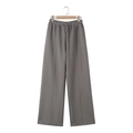 Detail of grey wide-leg sweatpants with drawstring waist and stitched center seam - Gray Pants