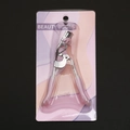 Silver eyelash curler with pink handles and built-in comb in retail blister packaging - Chrome Curler with Heart Silicone Handle Comb Matching Rubber Pad Blister Card Pack
