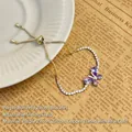 Bracciale a farfalla regolabile placcato oro con zircone viola e cristalli bianchi - Stile Regolabile a Farfalla / Bracciale-Viola