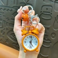 Creative mini orange alarm clock keychain pendant with matching bell accessory for bags - Orange
