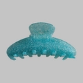 Detail view of large blue glitter acetate shark hair claw clip for elegant styling - Glitter Light Blue
