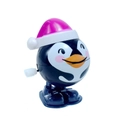 Wind-up penguin toy with pink Christmas hat and mechanical side knob for holiday gift - Wind-up Penguin without Glasses