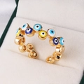 Adjustable gold plated evil eye ring with colorful enamel inlay on white velvet jewelry box - Sunburst Radiating Eye (Style 6)