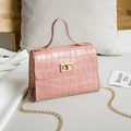 Pink crocodile texture Kelly handbag with golden chain strap and metallic twist lock - Pink