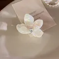 Iridescent flower hair claw with crystal in pearl white finish, 6cm size - White Small Flower