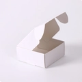 Minimalist white cardboard jewelry gift box in a semi-open position on white background - 40*40*20mm / 350g White Cardboard
