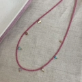 Pink natural stone beaded necklace with turquoise accents and gold butterfly charms - Pink