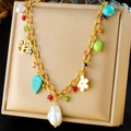 Golden multi-element charm necklace with baroque pearl, tree of life, and colorful crystals - Tree of Life Petal Pearl Style (N3112)