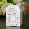 White laser-cut elephant favor box with satin ribbon and heart-shaped patterns - White