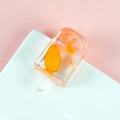 Creative resin popsicle keychain featuring realistic orange and mango fruit slices inside - Almond