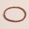 Minimalistisches 4mm rotbraunes Goldfluss Energie-Perlenarmband für Damen mit Glanz - Goldener Sandstein