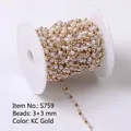DIY beaded chain with white pearls and KC gold beads on a white plastic spool - 3+3mm / KC Gold