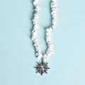 Irregular white stone beaded necklace featuring a vintage silver sun pendant - White Turquoise Sun