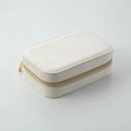 Portagioie portatile in velluto beige con cerniera dorata per anelli e orecchini - Beige