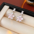 Pink sakura drop earrings with silver cat stud and zircon stone in a jewelry box - Silver Cat Cherry Blossom Pink Petal Style