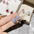 Teardrop silver stud earrings with sparkling white stones and halo detail - White Diamond Teardrop Earrings Led-141