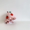 Detailed knit texture of pink baby hat with red apple pattern and ruffled edge - 48cm (6M-2Y) / Pink