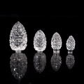 Set of four transparent pinecone-shaped LED light covers in varied sizes on a black background - Small Pinecone 1.6*3.2CM (Transparent)