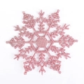 Gros plan d'un flocon de neige rose pailleté pour décorer le sapin et les couronnes - 10CM-5g (avec corde) / Rose