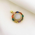 Macro detail of a colorful circular pendant with crystals on white fabric background - Gold Colorful Marquise Gemstone Charm