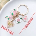 Detail of heart keychain with pink rose, poker card and I Love You pendant engraving - Pink White Heart Rose Card Style (ER878)