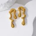 Minimalist golden fluid lava earrings with irregular liquid drop design in polished steel - 14k / Gold
