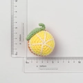 Handmade crochet orange fruit keychain charm with green leaves and knitted texture - Orange Slice Pendant Style B