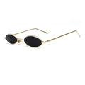Vintage oval mini metal sunglasses with gold frame and black lenses in a 45-degree view - Gold Frame Black Grey