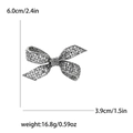 Spilla a fiocco vintage con strass grigi e raffinato design in lega metallica - Nero Lucido