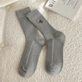 Gray ribbed mid-calf cotton socks with small black butterfly embroidery detail - One Size / Light Gray
