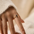 Detailed view of an adjustable gold ring with blue oval stone on a beaded band - Adjustable Open / Blue (KR0045-1)