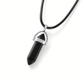 Detail of a black hexagonal stone pendant with a silver clasp on a leather cord necklace - Black Agate