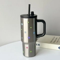 Large stainless steel tumbler with handle and straw featuring colorful star patterns - UV Printed Handle Cup Silver