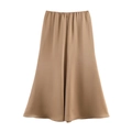 Detailed view of the smooth satin texture and elegant drape of this champagne long skirt - XS / Khaki