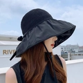 Women's black sun hat with wide brim, straw weave top, and adjustable chin strap - Black with Ribbon