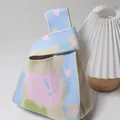 Pink peach pattern knitted knot bag with blue accents for wedding guest gifts - Heart Flower Cyan