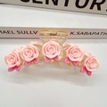 Transparent hair claw clip with five pink resin roses and delicate gold spring mechanism - Rose With Leaves (10cm)