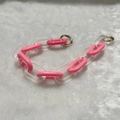 Close-up of frosted and pink acrylic chunky chain strap with gold metal ring buckles - Frosted Tender Pink