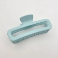 Close-up of light blue matte square hair claw clip with cutout design on white background - Large (13CM) / Lake Blue